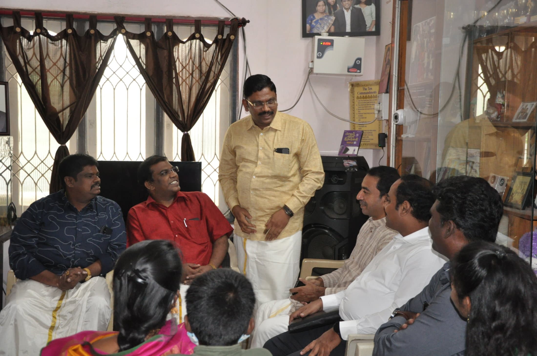 A small gathering meeting in a home.